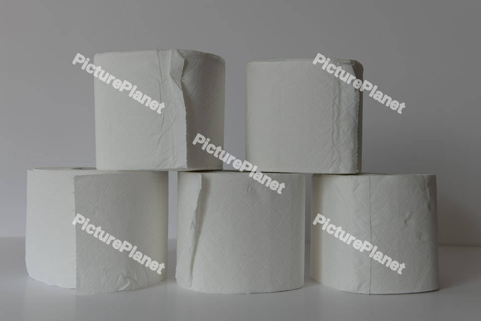 Stacked toilet paper rolls